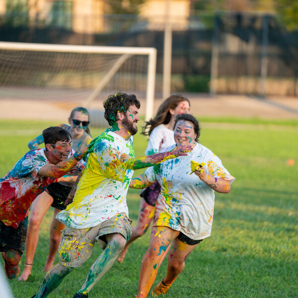 McKinney seeks to reach students academically in the classroom, but also outside of the classroom as he interacts with them in events sponsored by the Office of Student Life, including the TBC Paint War.